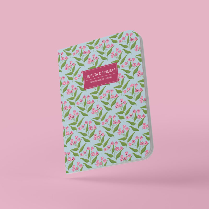 Libreta de notas Copihuito en ángulo con diseño de flora nativa de Chile, sobre fondo neutro